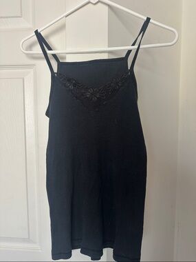 Black tank top with floral lace accent